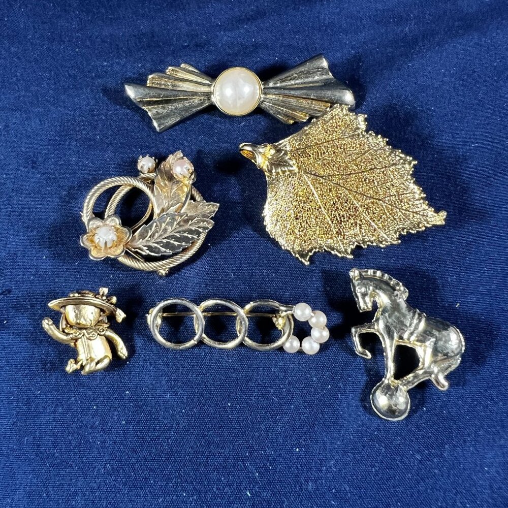 Vintage Gold Tone Brooch Lot Of 6 - Pearl & Floral Designs Leaf Horse Bow & More